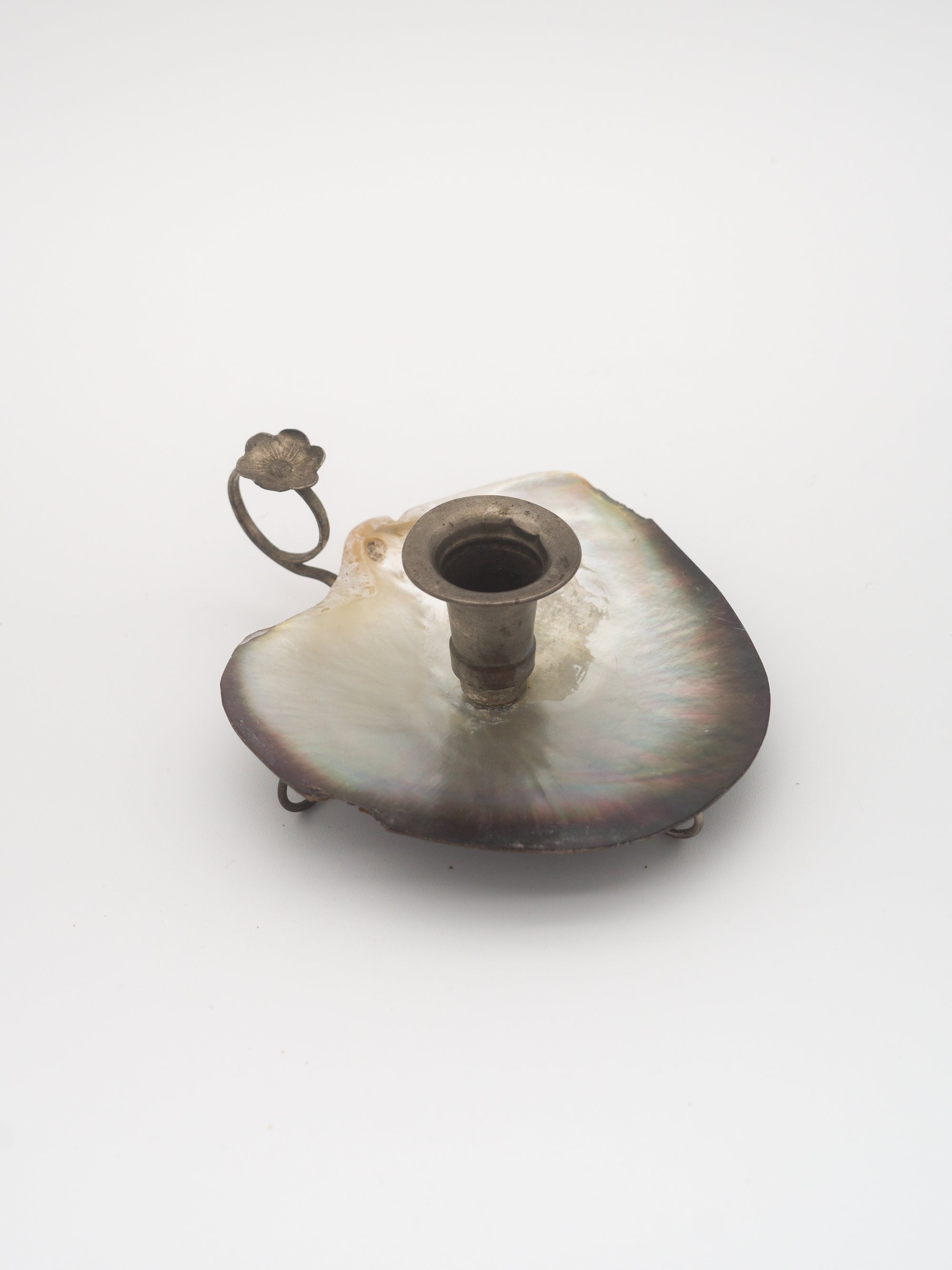 Shell footed candle holder